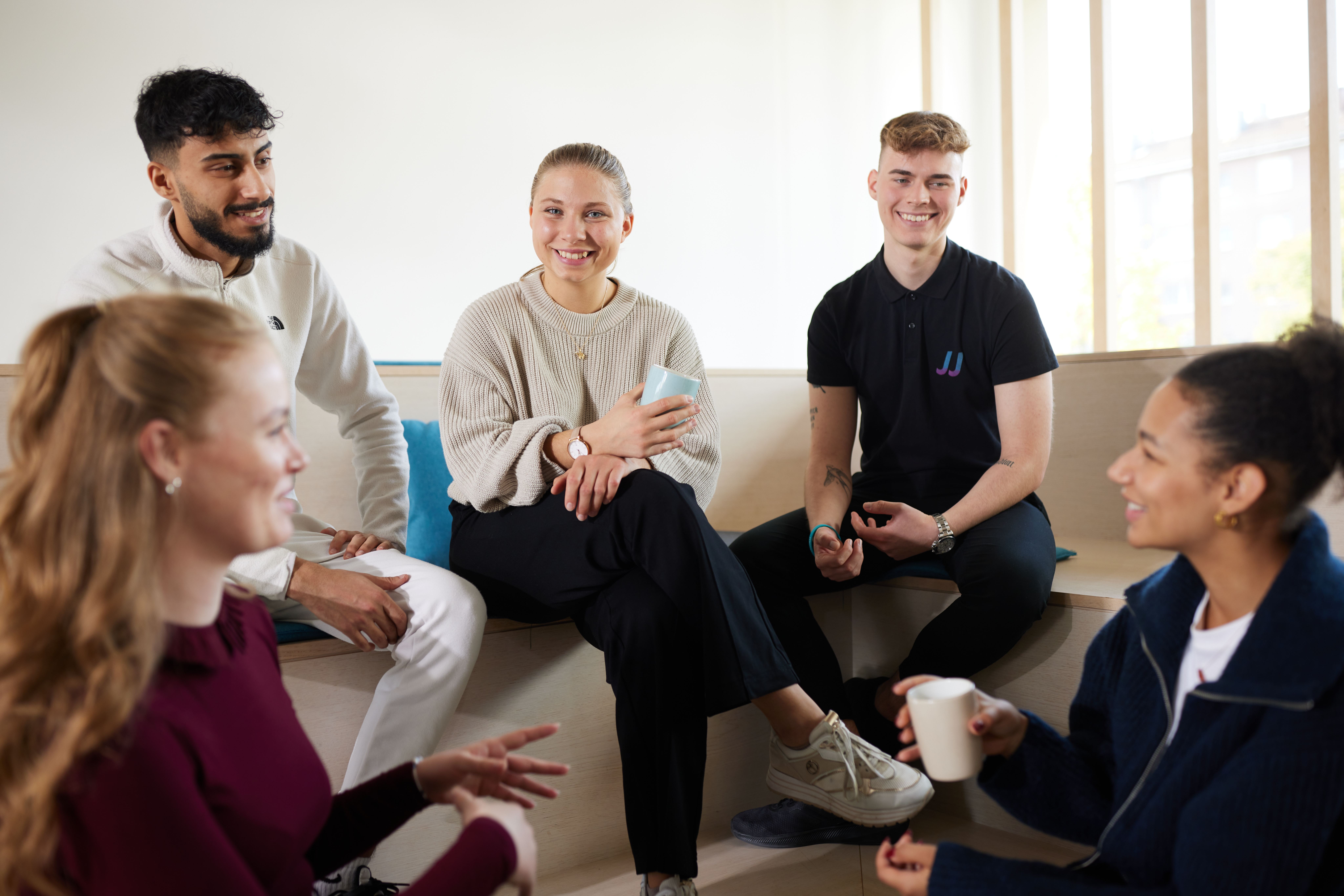 Group of Motel One students chatting Group of Motel One students chatting