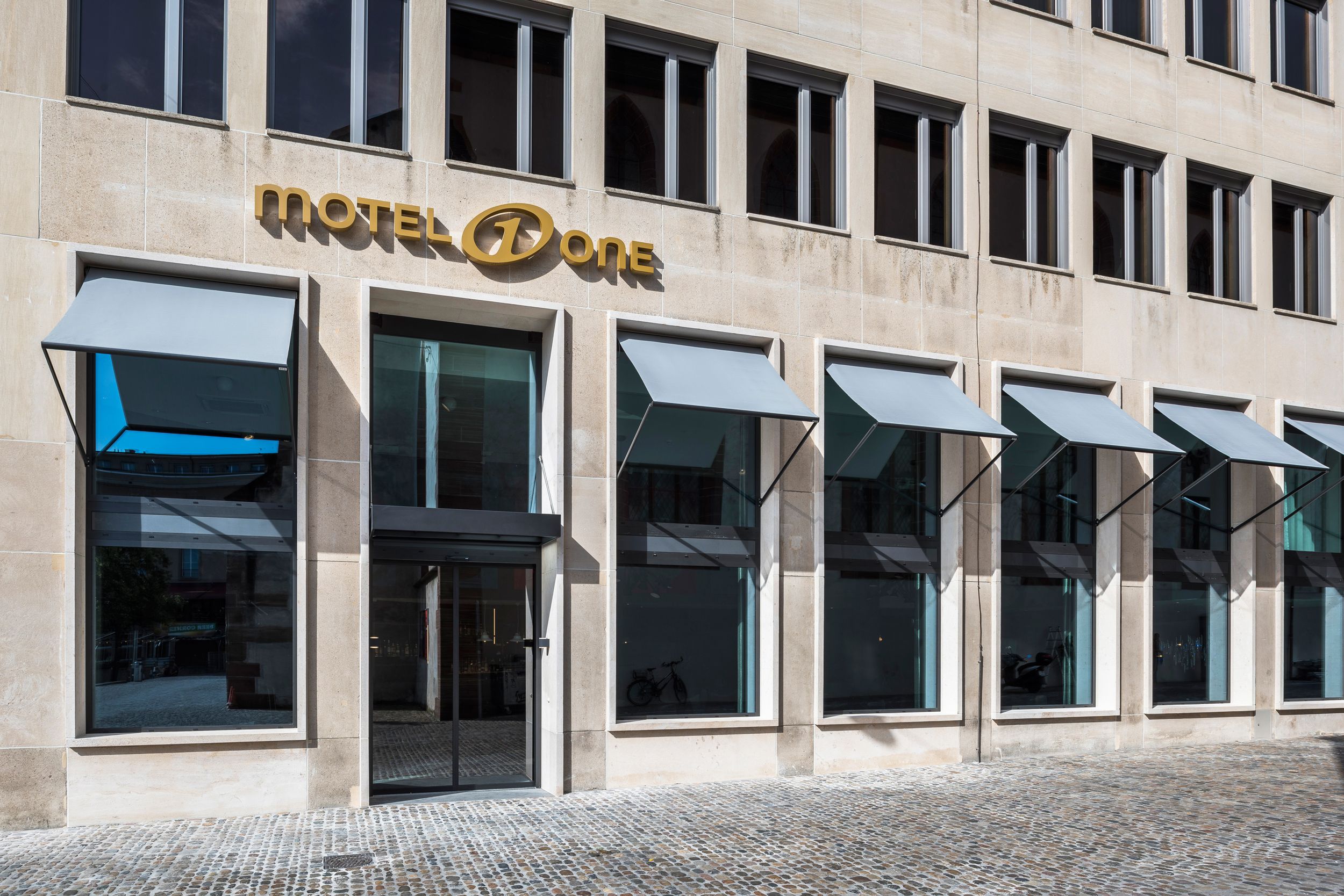 hotel Basel Motel One facade with logo