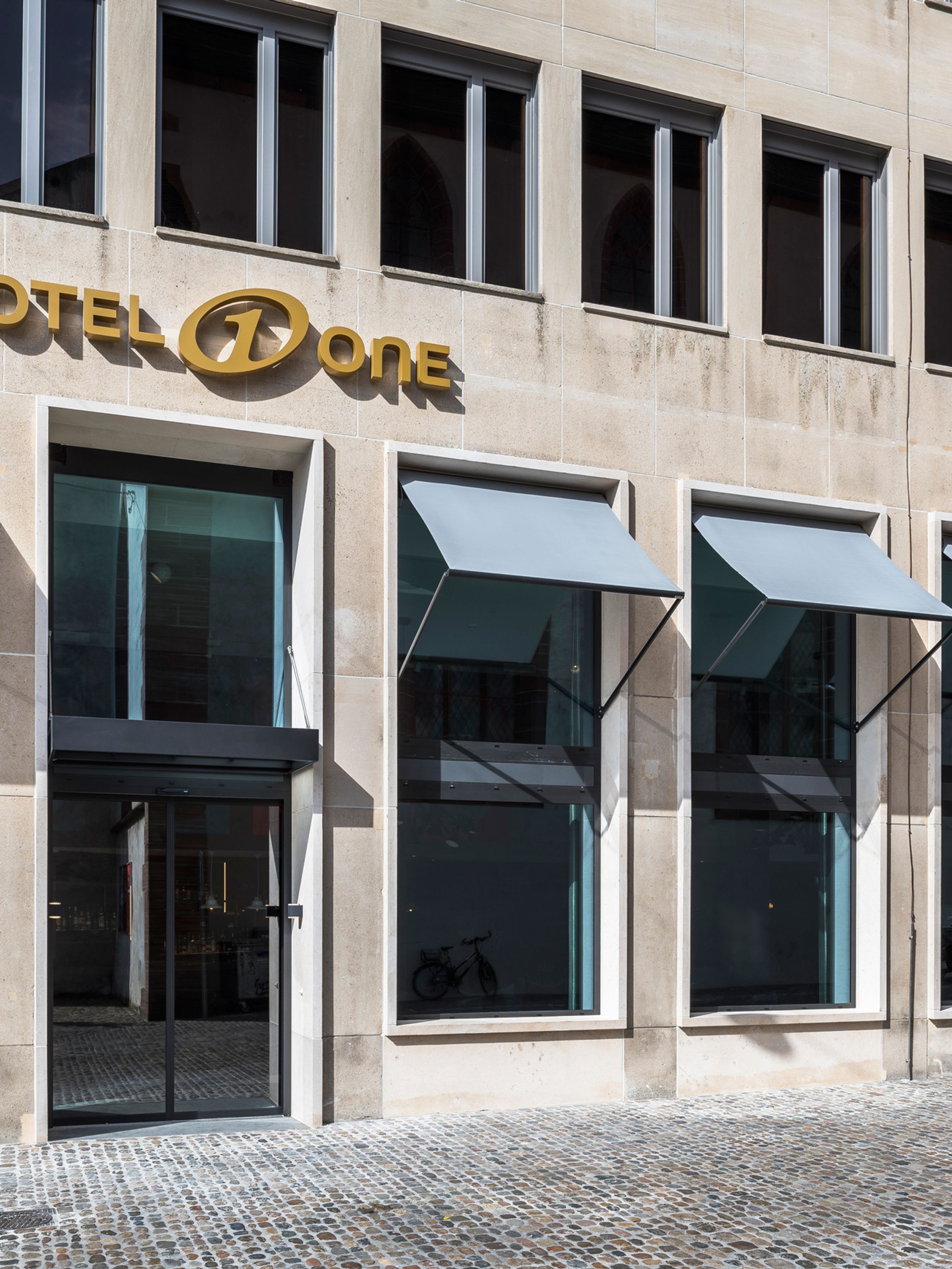 hotel Basel Motel One facade with logo