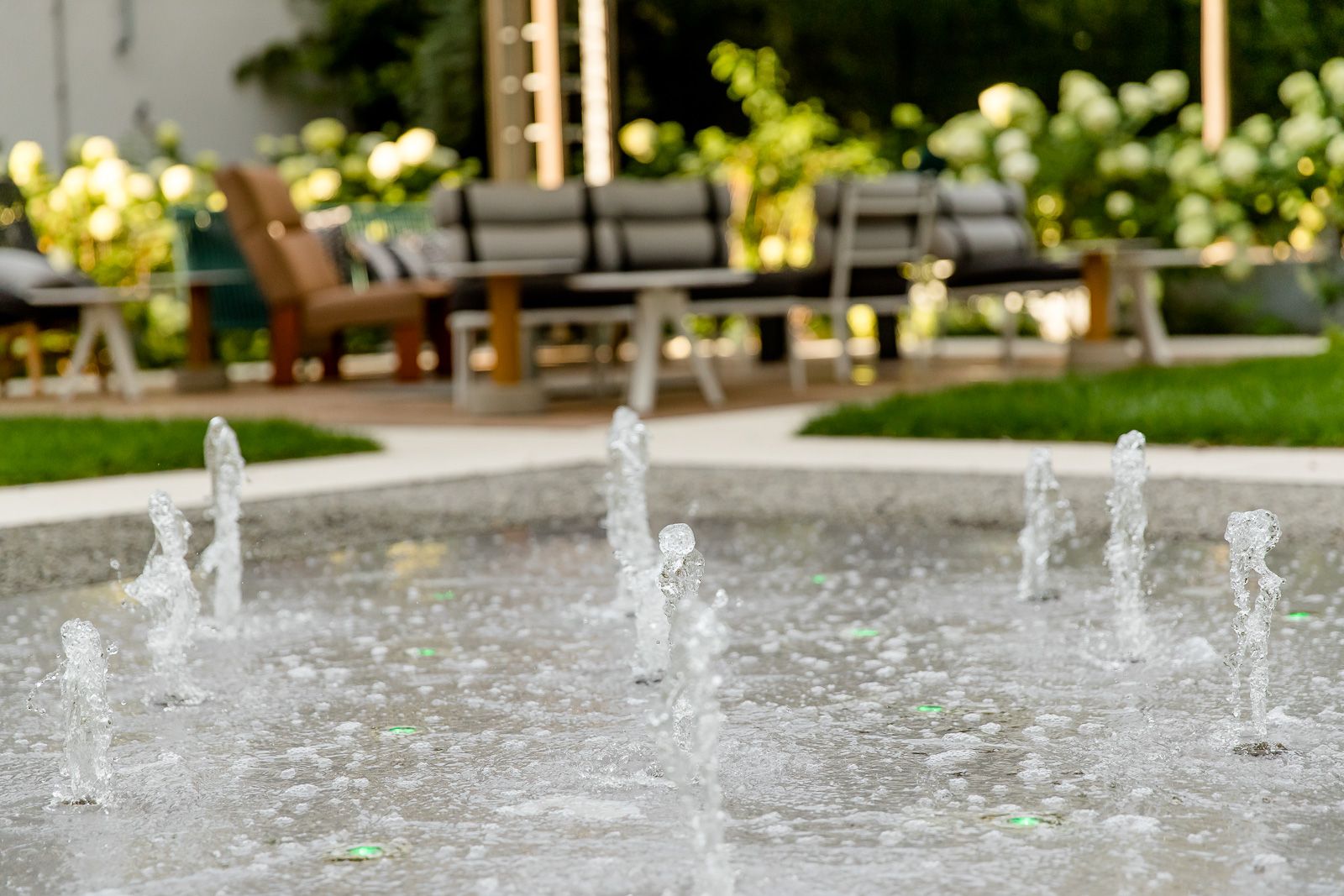 hotel Berlin Hauptbahnhof Motel One close-up of several water fountains on the ground in the outdoor area