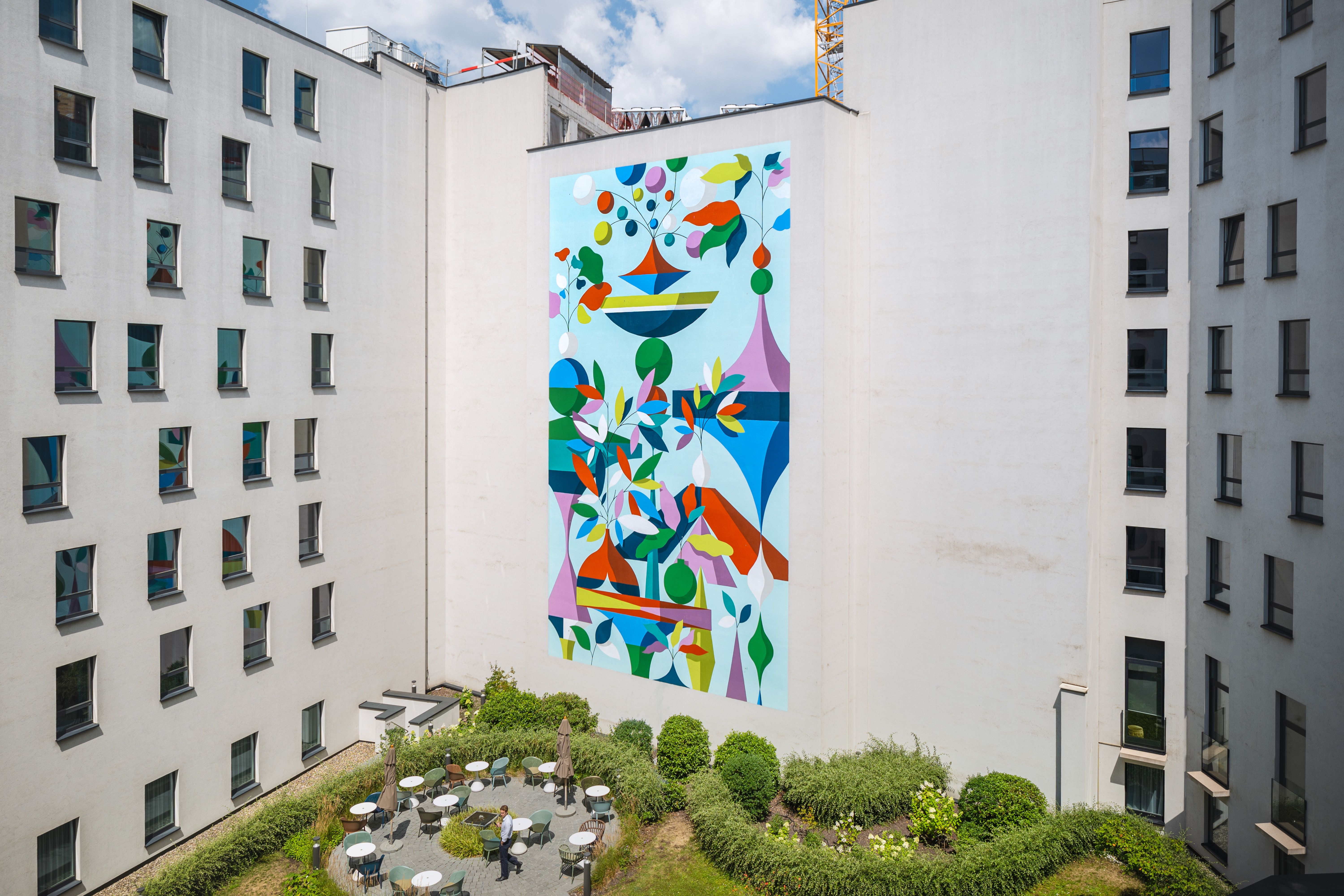 Design hotel Brussels Motel One mural on the façade in the inner courtyard
