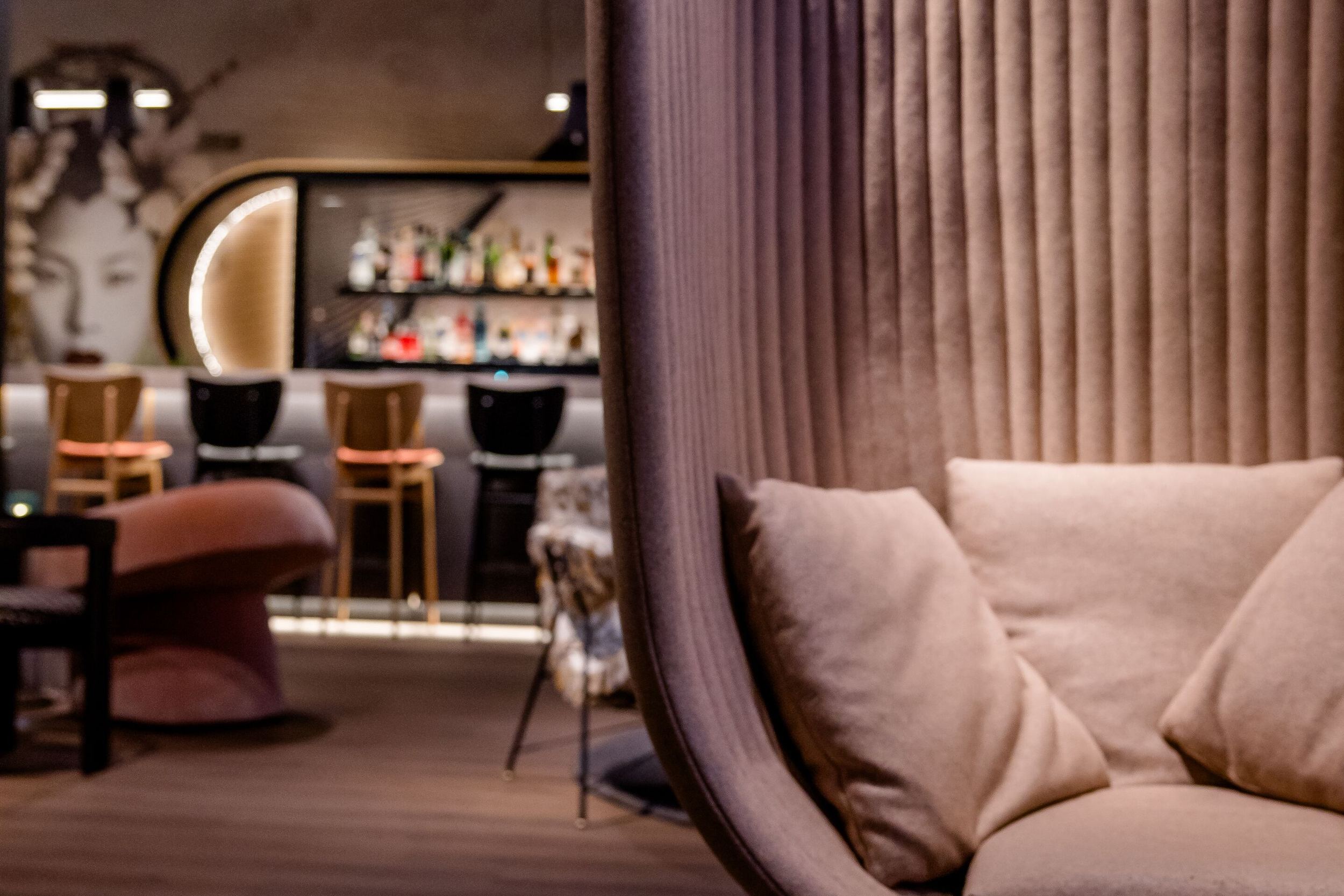 Hotel Dusseldorf Hauptbahnhof Motel One lounge and bar with armchairs and tables in the foreground