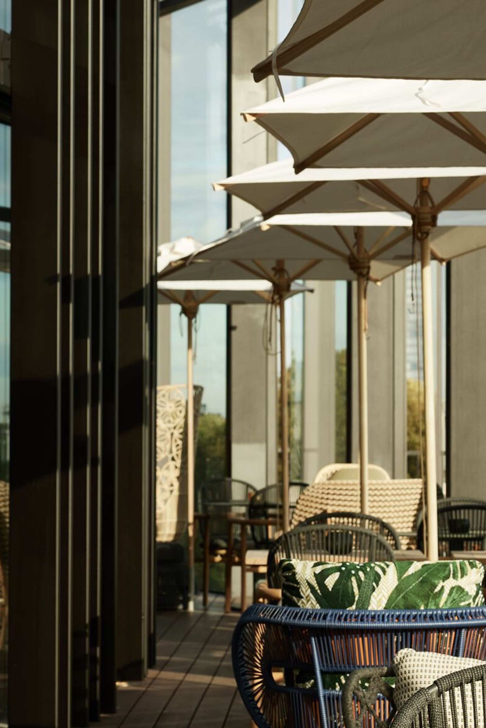 designhotel Düsseldorf KöBogen The Cloud One terrace with seatings and parasol