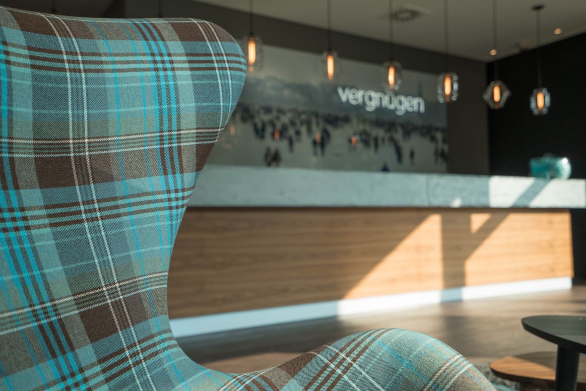 hotel Hamburg Alster Motel One egg chair in the foreground and reception desk in the background