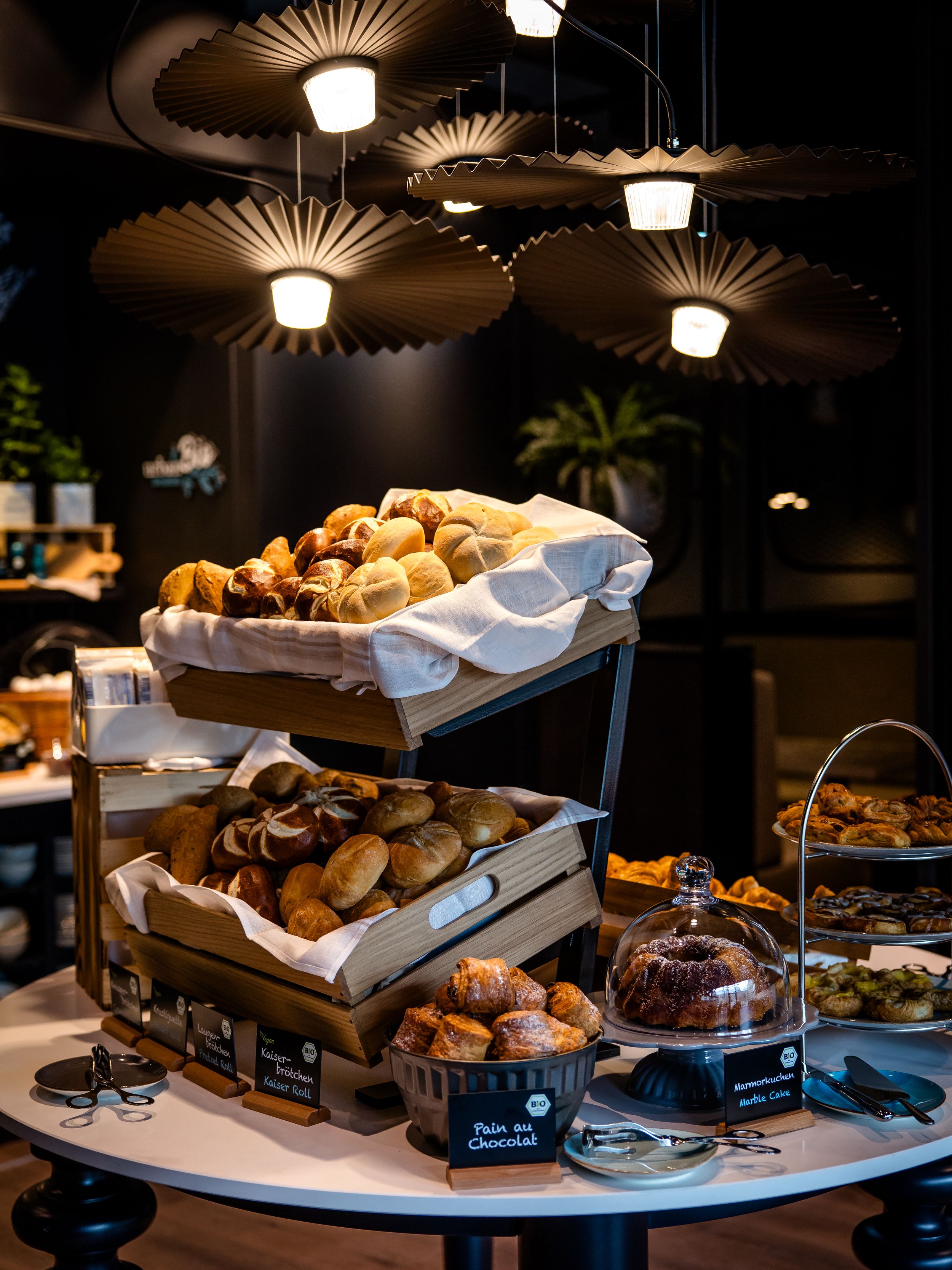 hotel Karlsruhe Motel One breakfast buffet with a view of baked goods