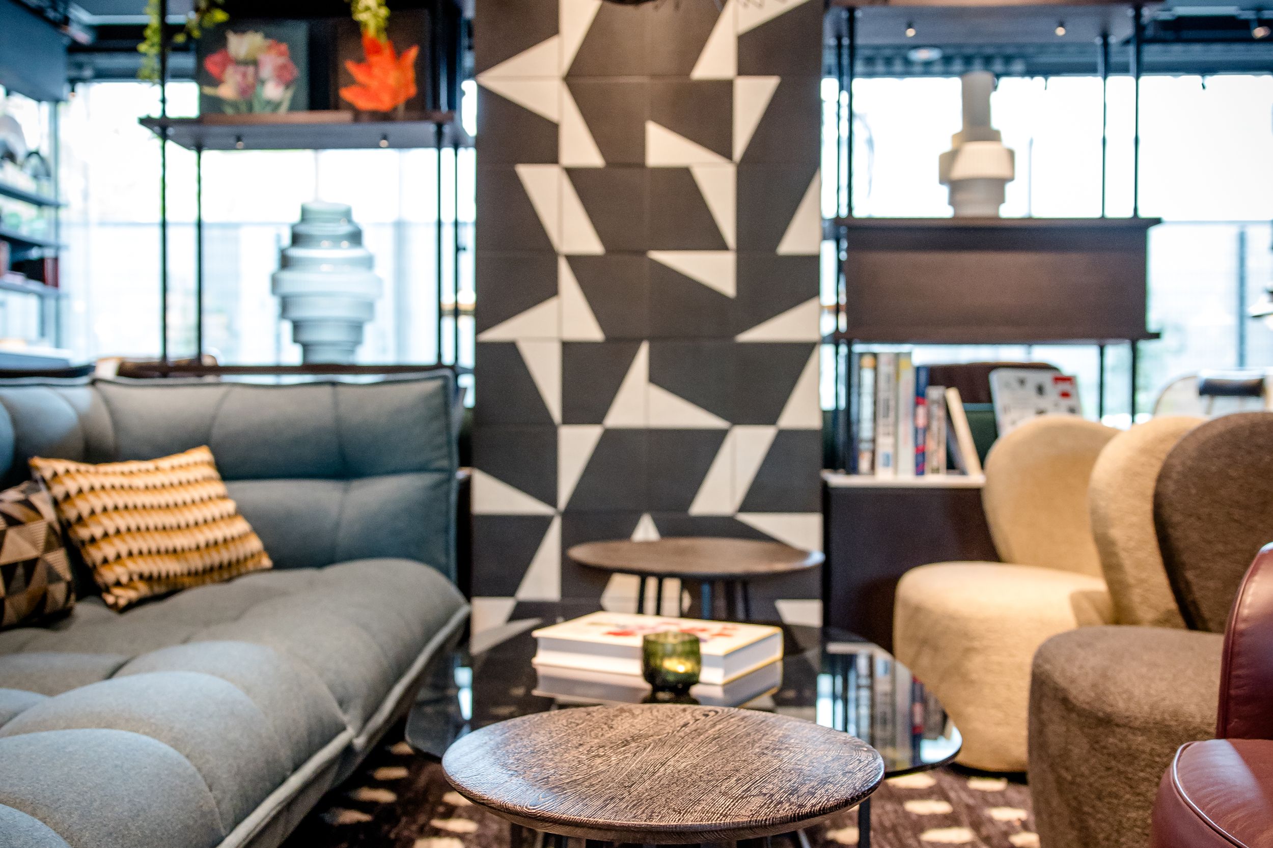 hotel Karlsruhe Motel One bright lounge with armchairs and large couch