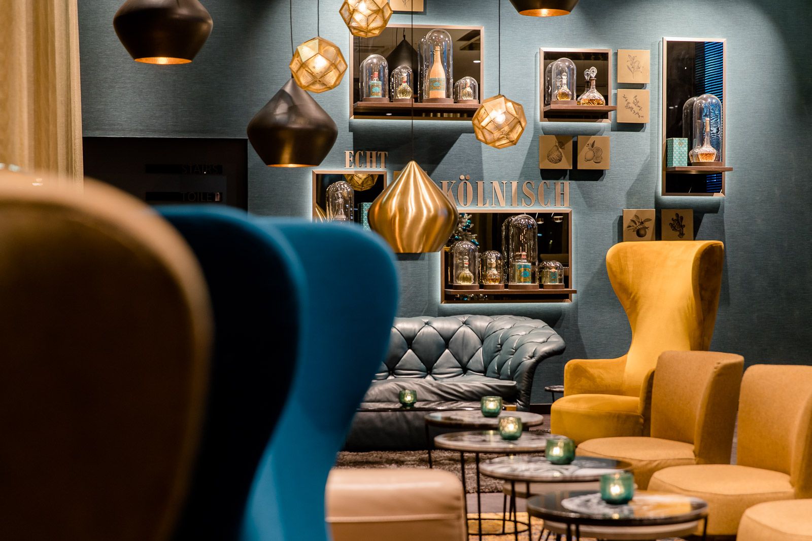 designhotel Cologne Altstadt Motel One lounge with yellow armchair and egg chair