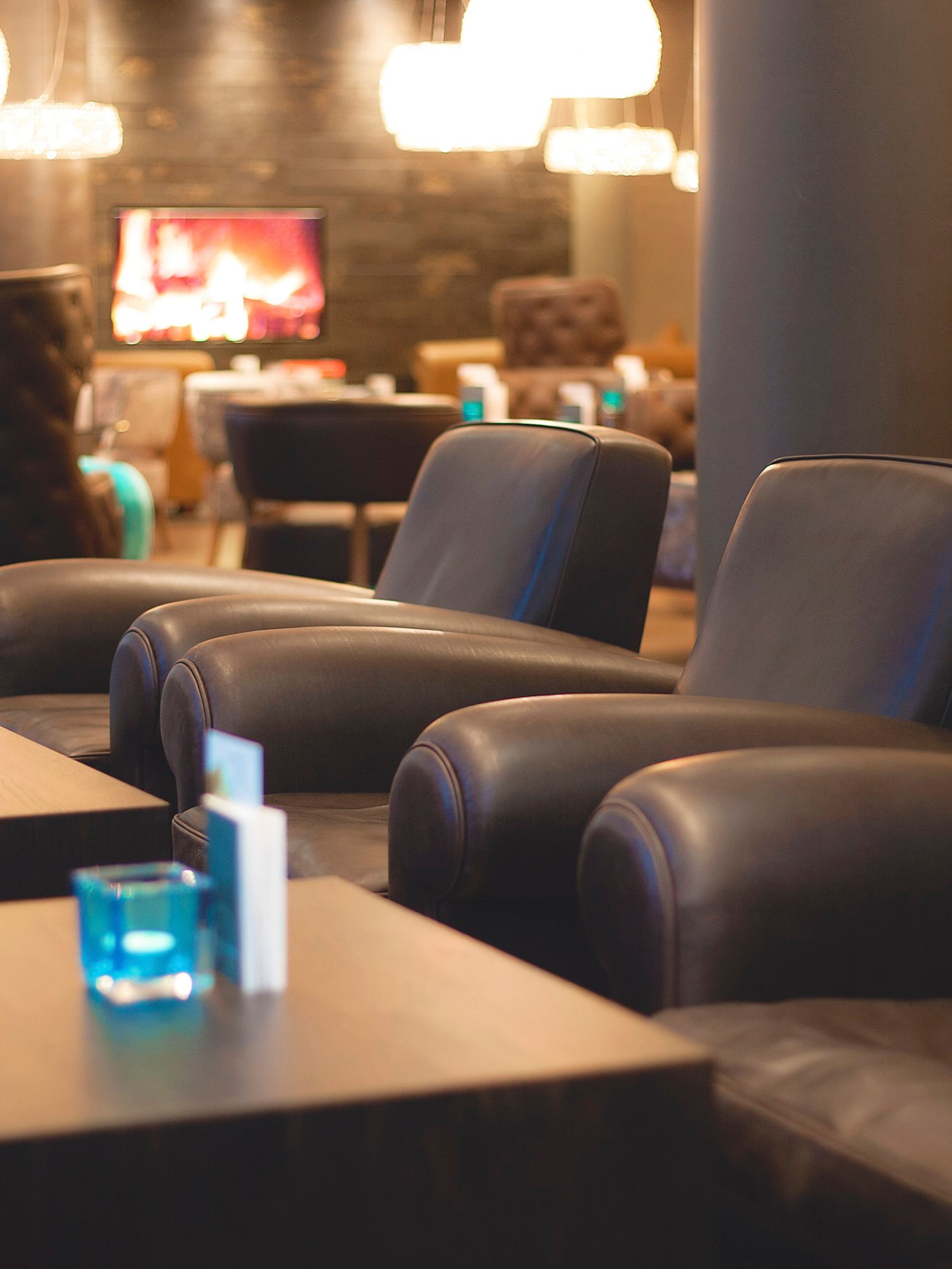 hotel London Tower Hill Motel One lounge with focus on tables and armchairs in the foreground