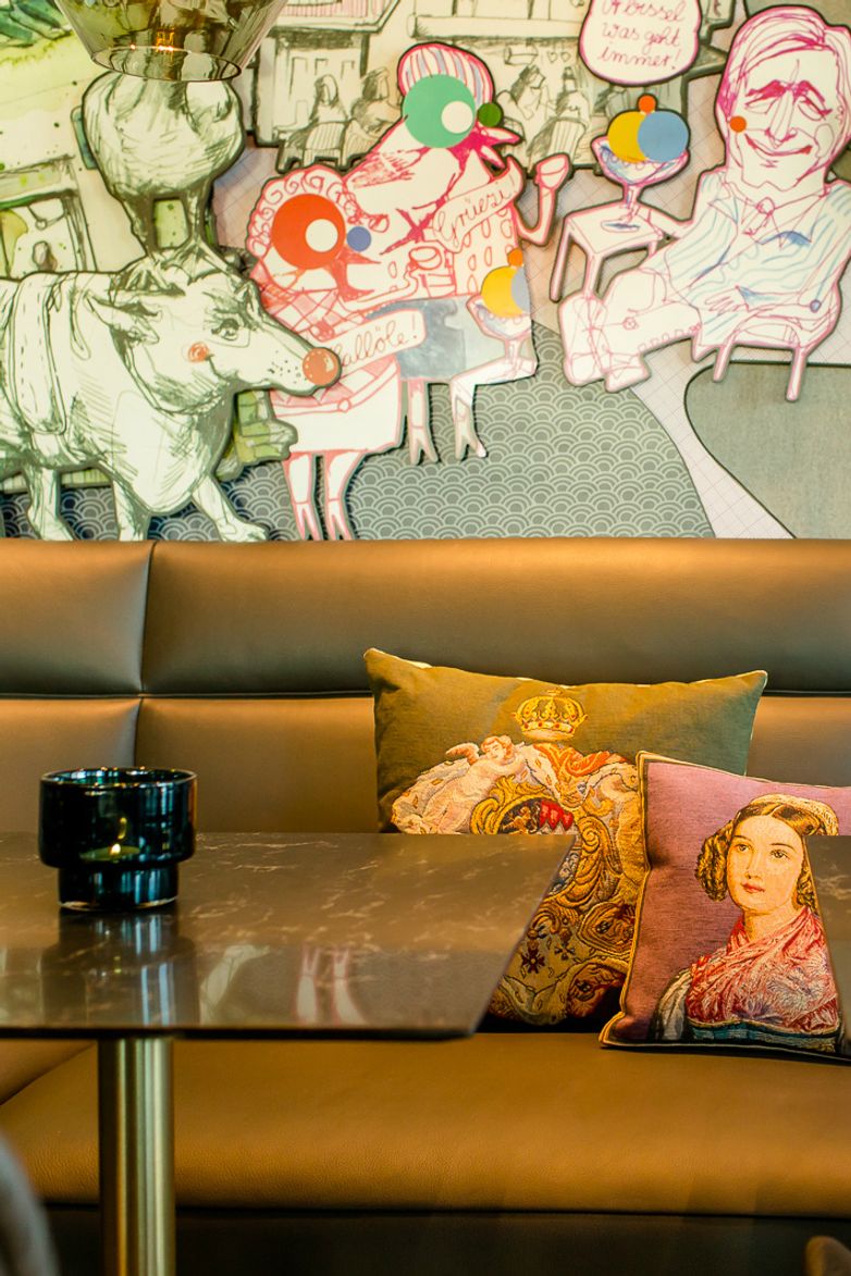 designhotel Munich Trade Fair Motel One close-up of armchair and table