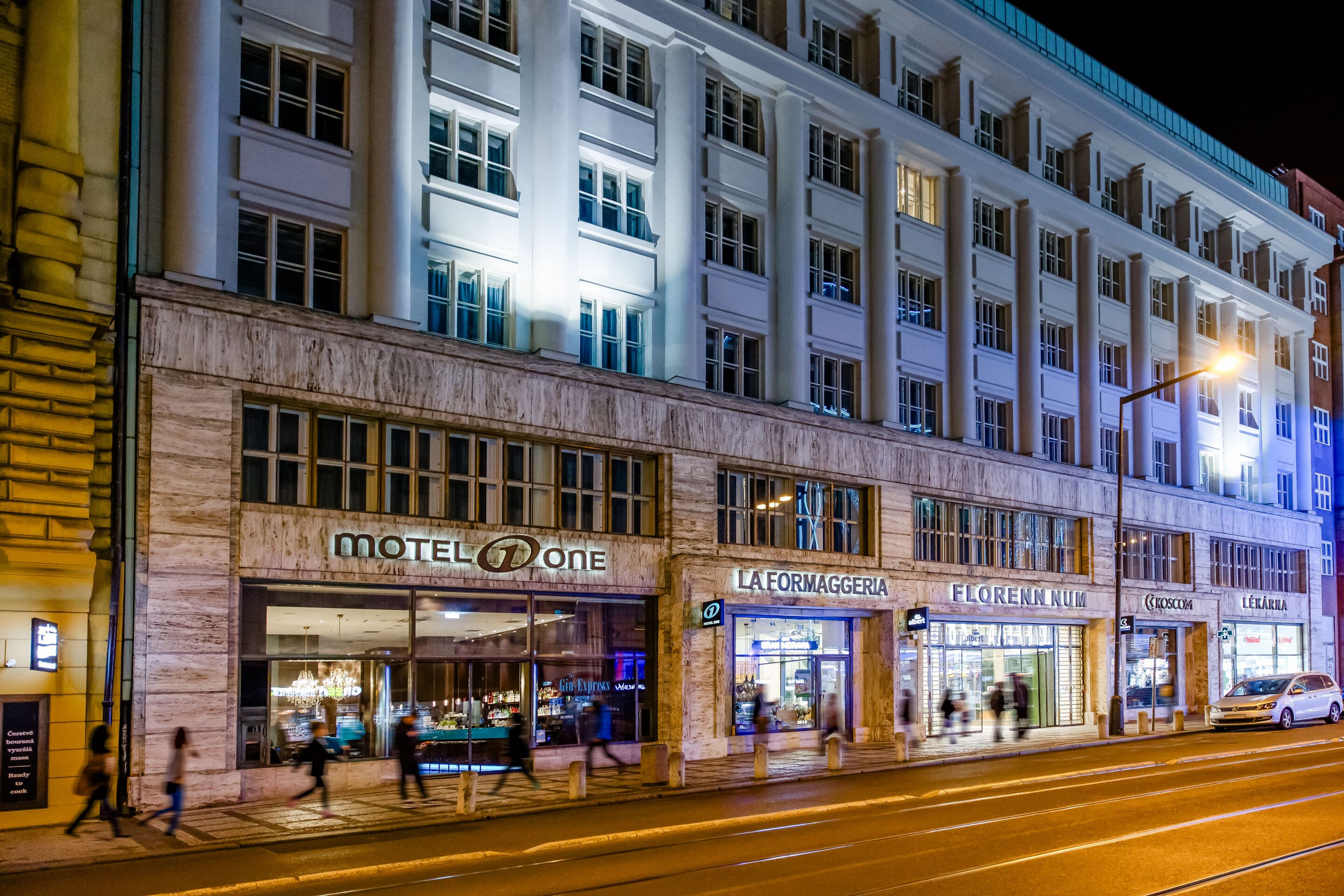 designhotel Prague Florentinum Motel One facade in the evening designhotel Prague Florentinum Motel One facade in the evening