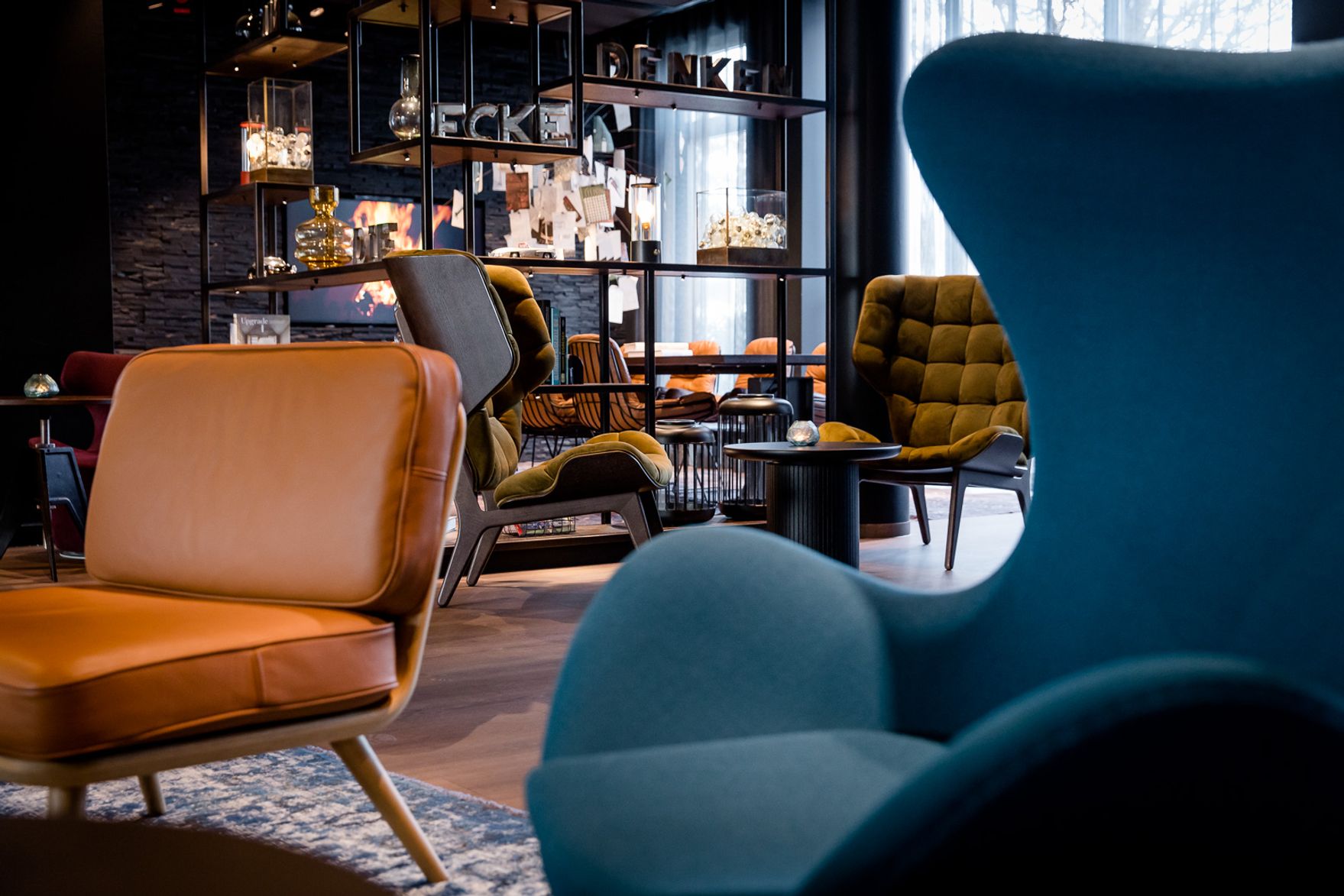 hotel Stuttgart Feuerbach Motel One lounge with armcharis and chairs