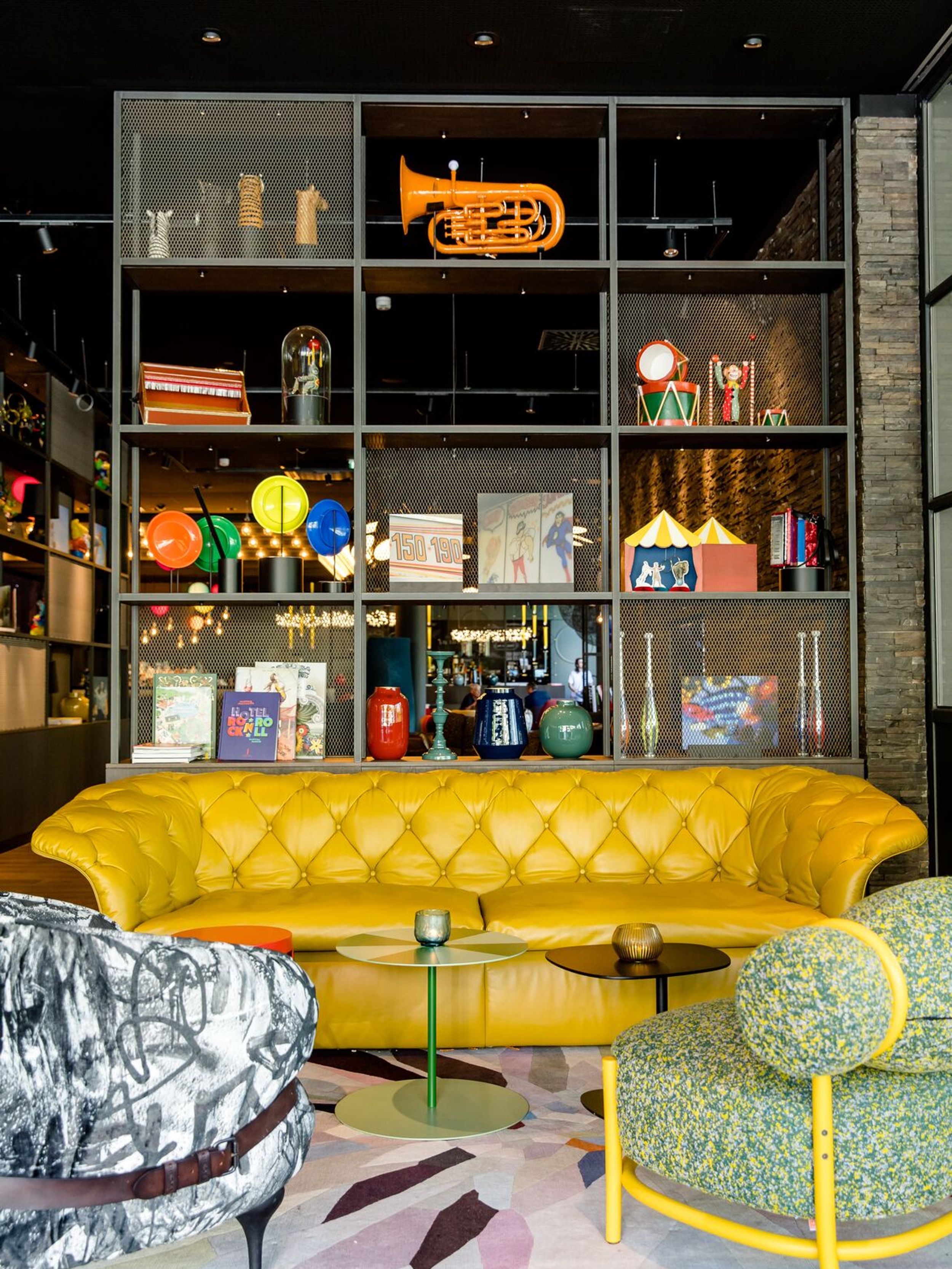 Designhotel Vienna Prater Motel One yellow couch in lounge