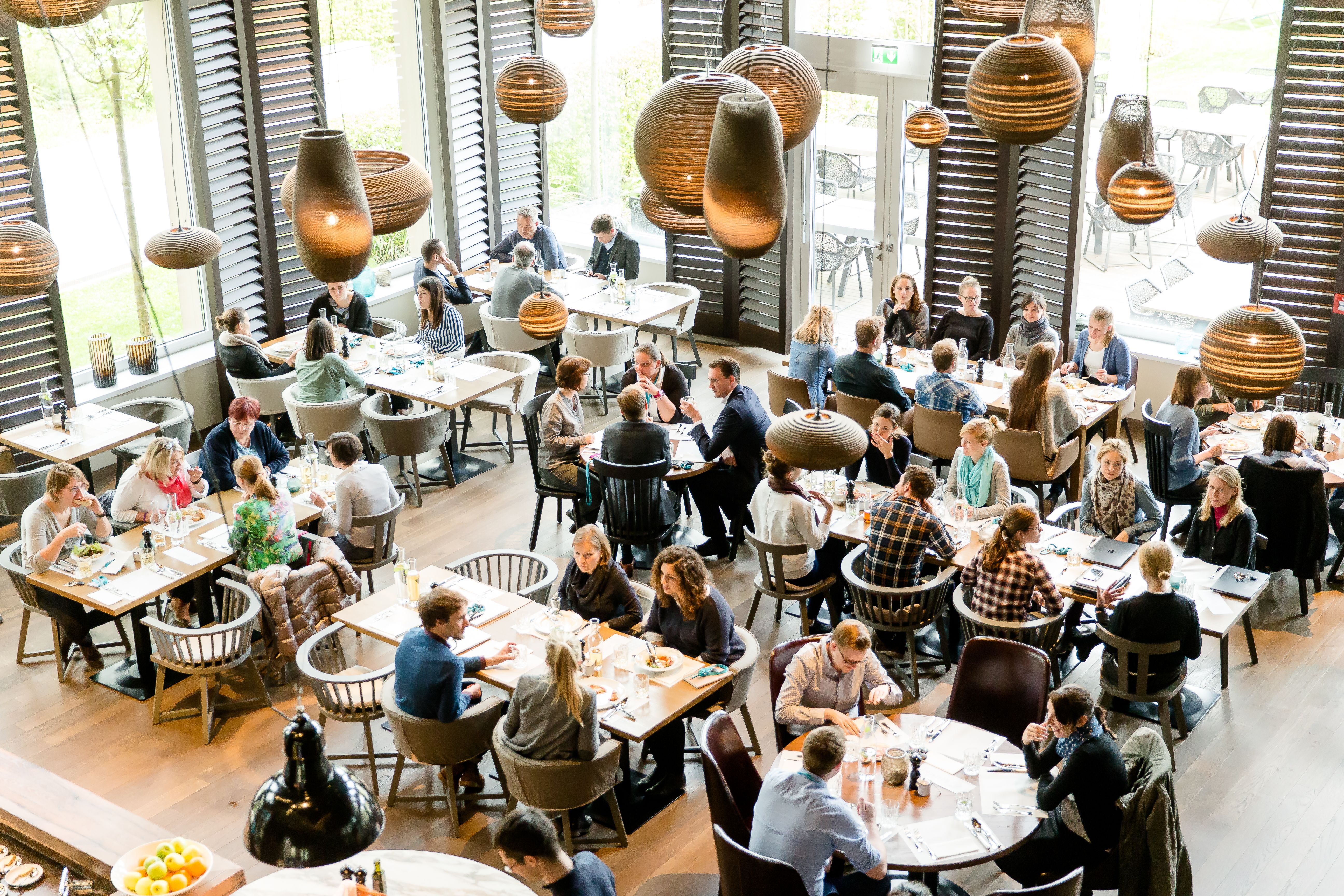 Mote One Headquarter employees at Motel One Munich-Campus having lunch