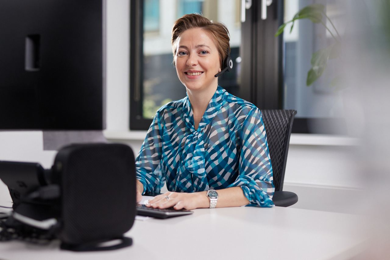 Motel One administration employee working on her computer