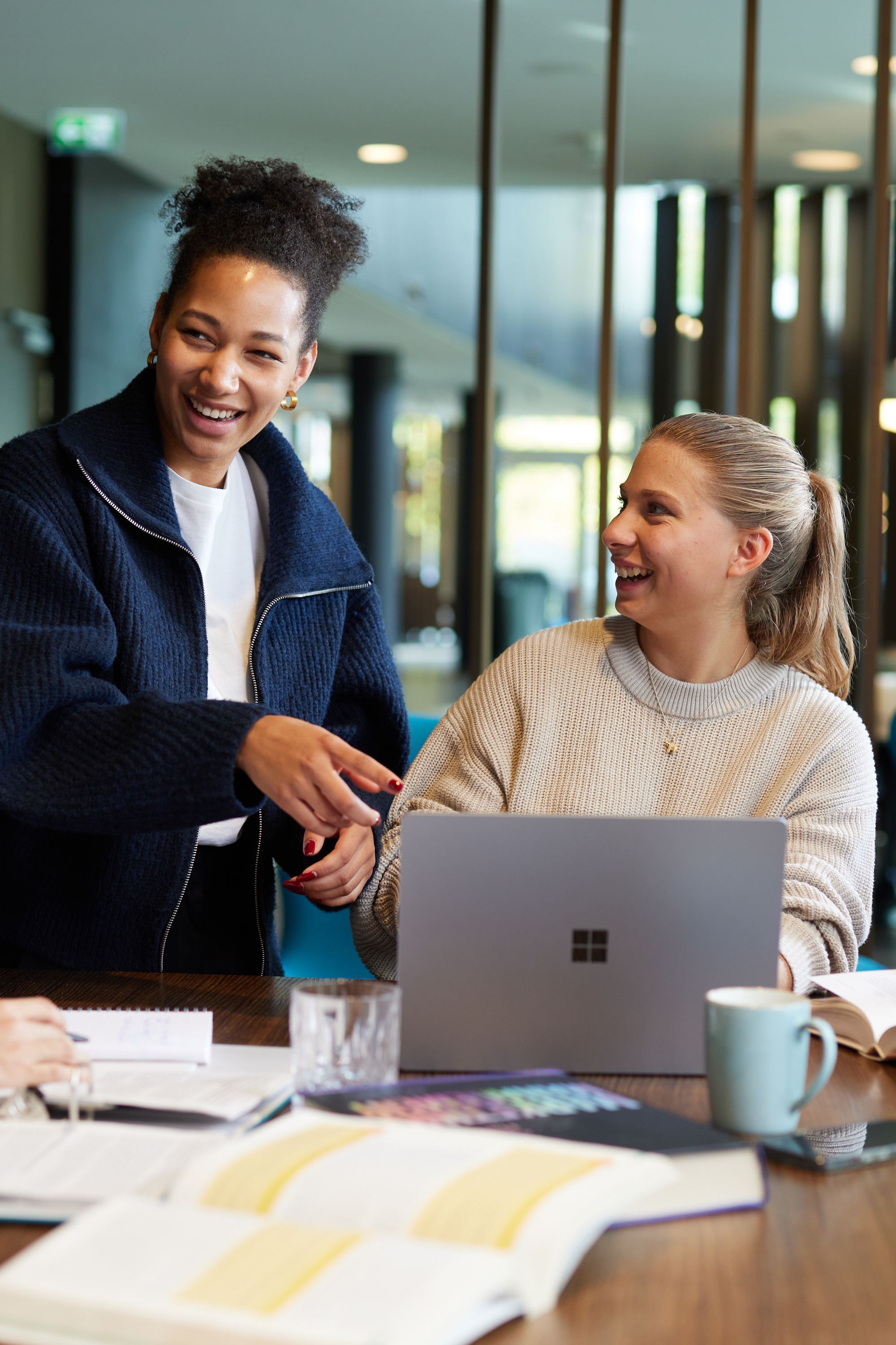 Group of Motel One students studying together