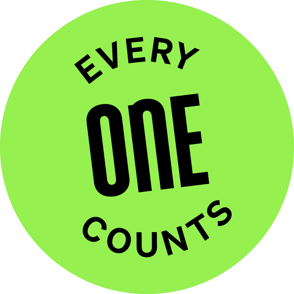 Grüner Kreis mit schwarzer Aufschrift „Every One Counts“, betont den Wert jedes Einzelnen.