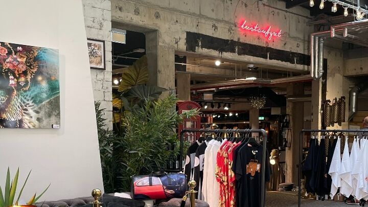 hotel Freiburg Motel One view of the Lust auf Gut store with sofa and clothes in front of the door
