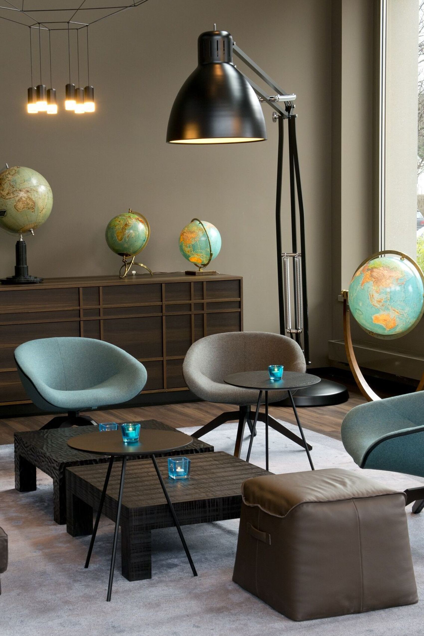 designhotel Munich Campus Motel One lounge, armchair and globes