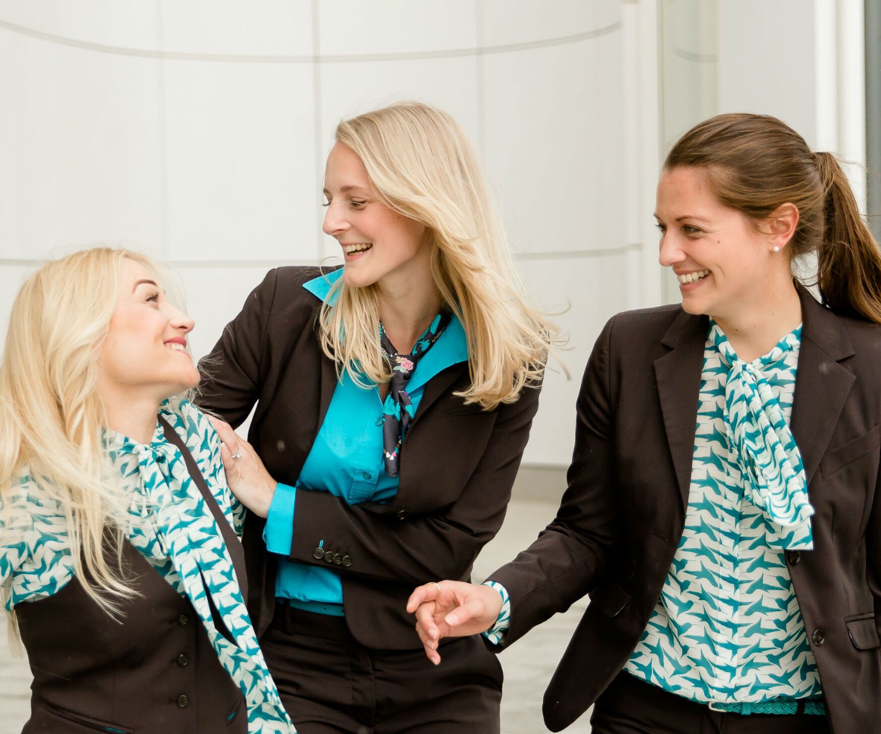 Motel One employees laughing together