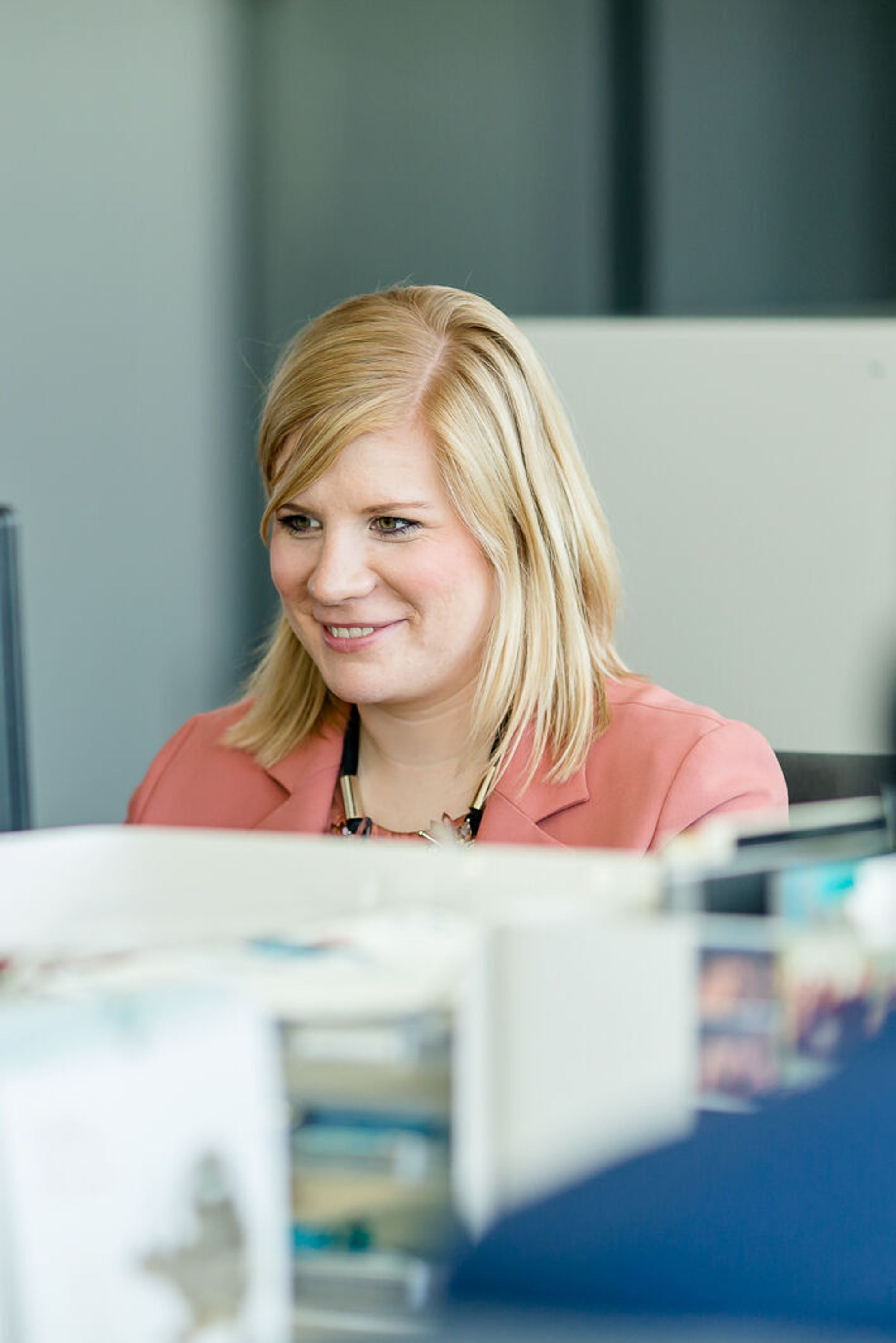 Motel One Group Headoffice employee working on her desk