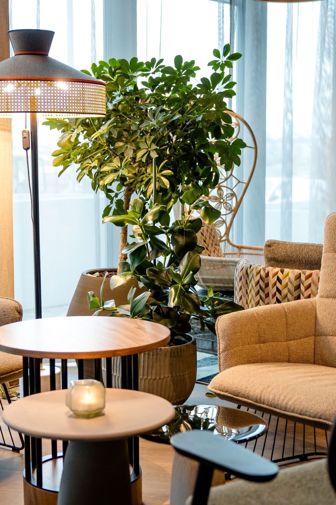 Design hotel Vienna Donau City Motel One lounge area with view of two armchairs with side tables