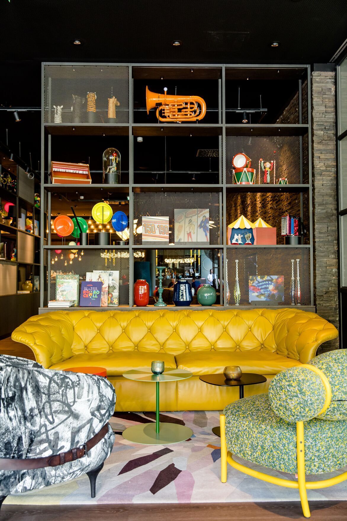 Designhotel Vienna Prater Motel One yellow couch in lounge