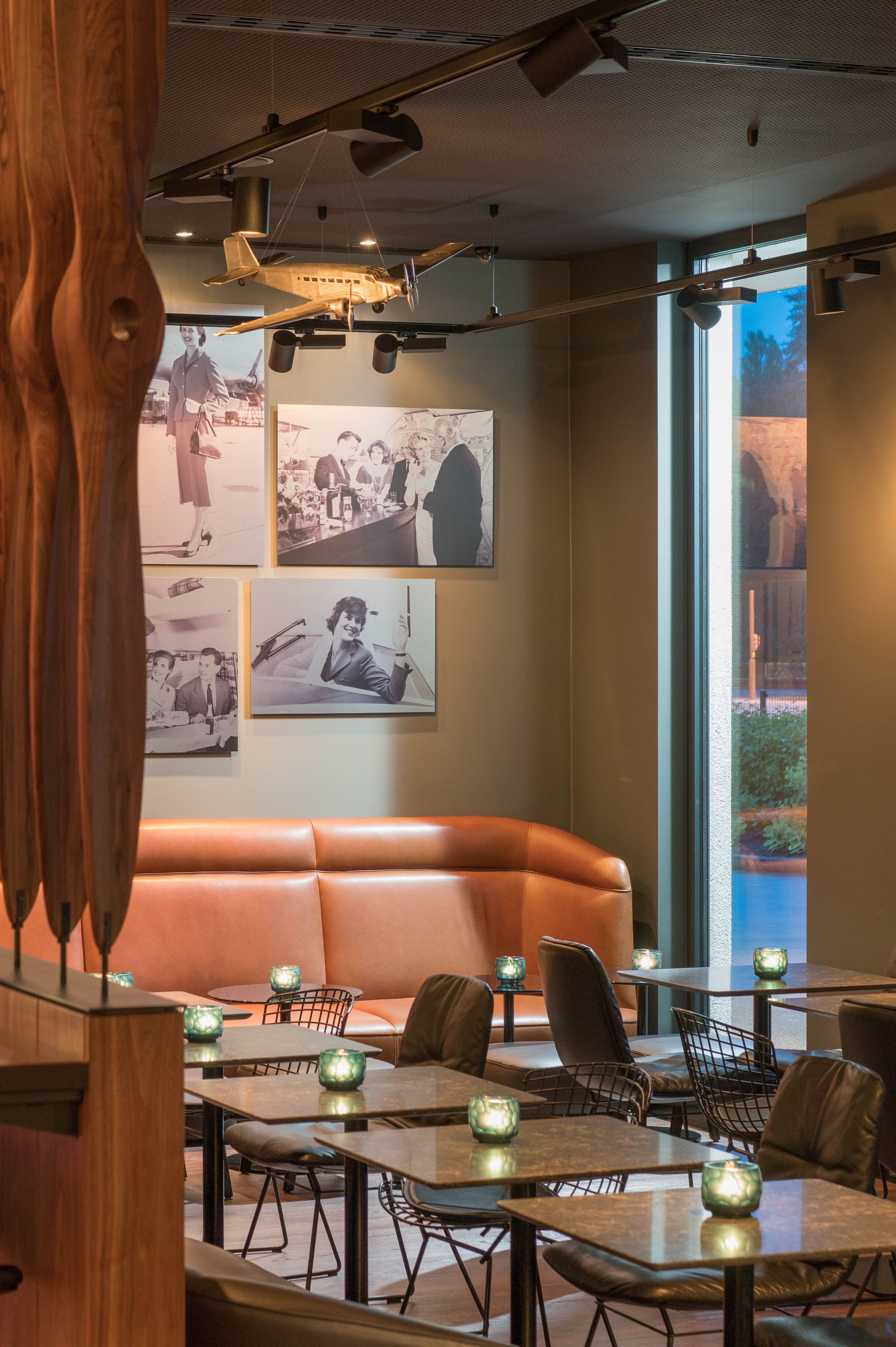 designhotel Hamburg Airport Motel One light-filled lounge with multiple seating areas