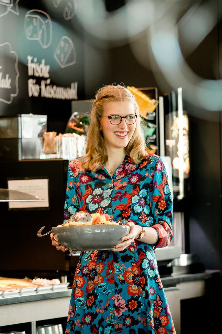 Motel One employee working in breakfast service Motel One employee working in breakfast service