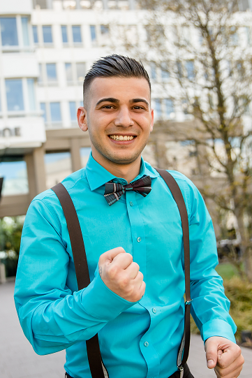 Motel One employee wearing dresscode cheering Motel One employee wearing dresscode cheering