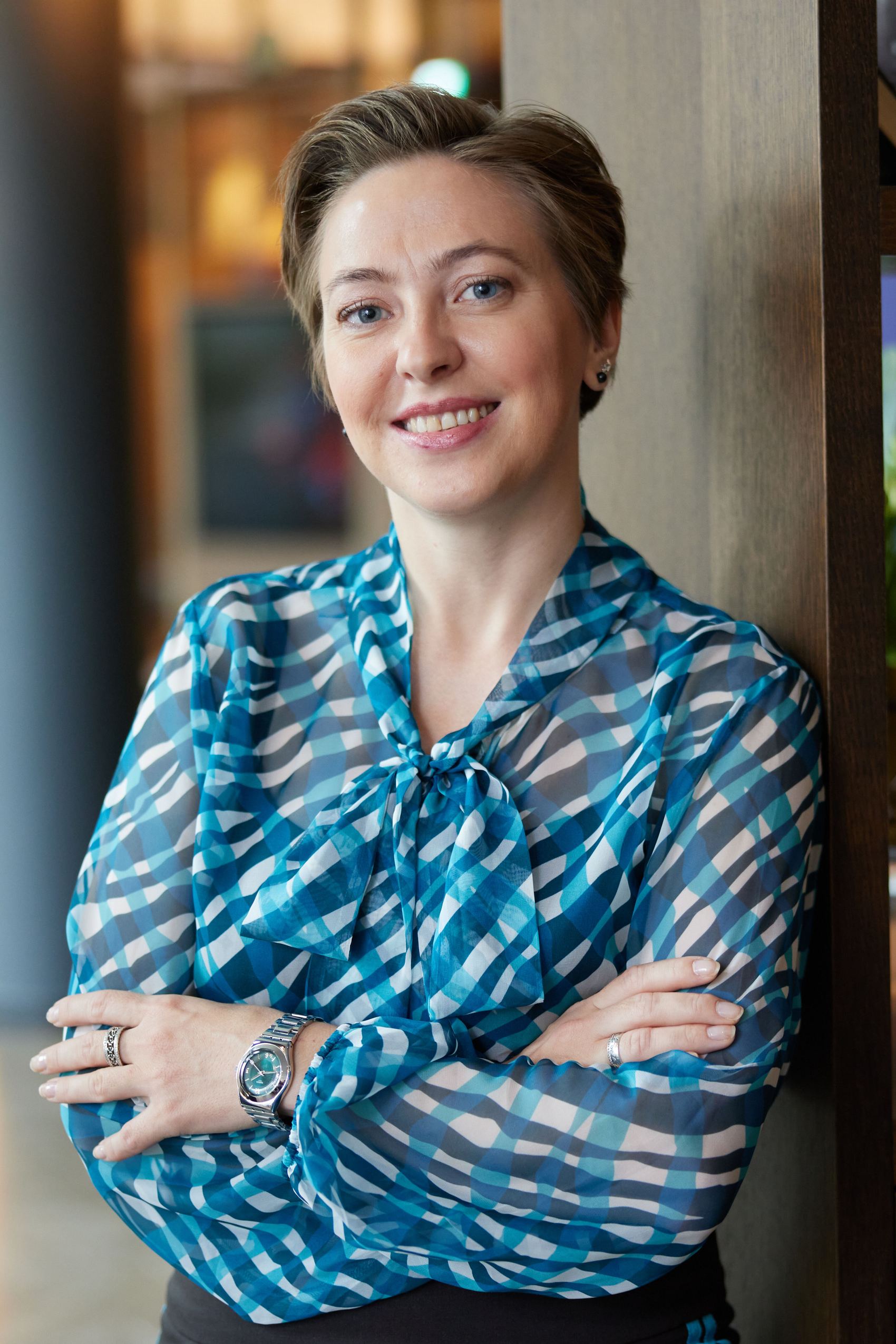 Motel One employee in portrait wearing dresscode