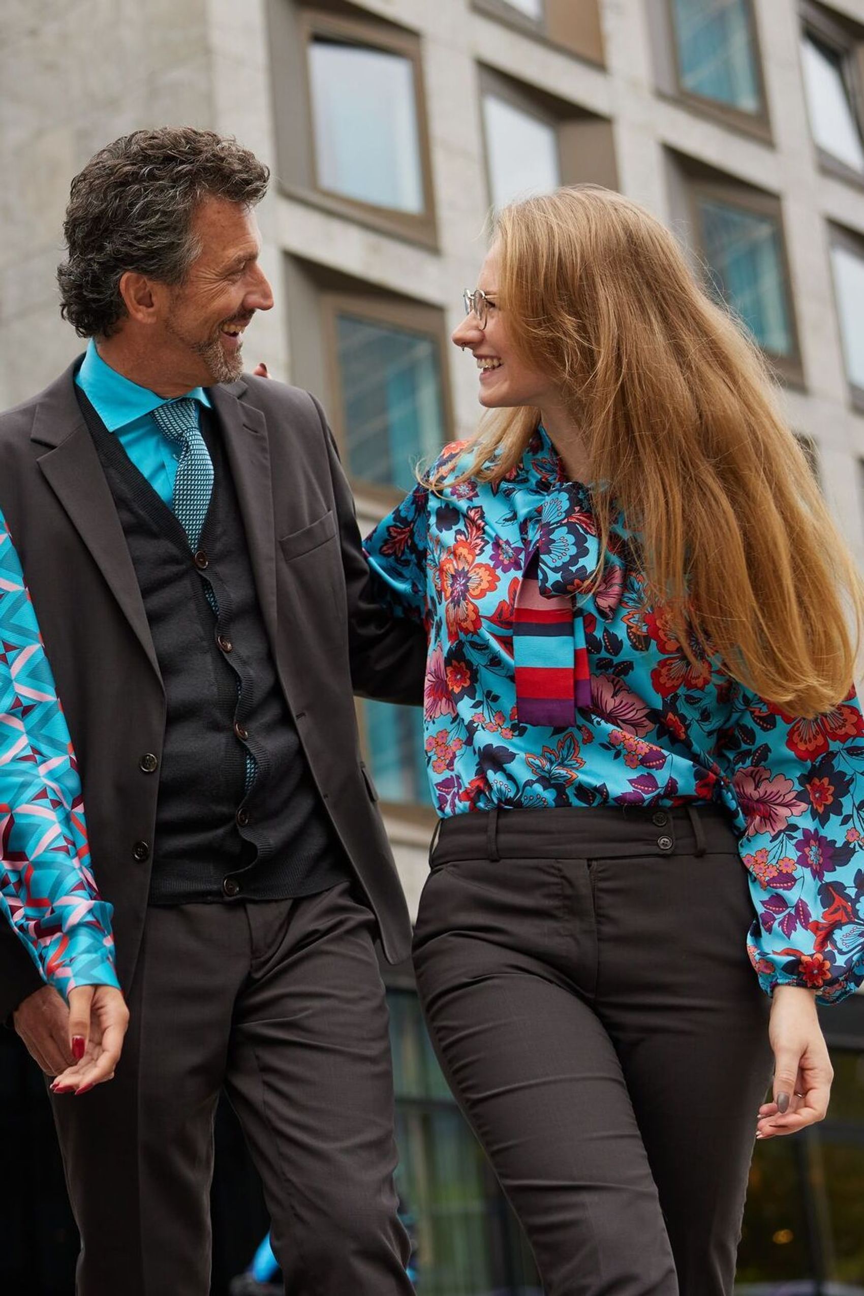 Motel One employees man and woman talking to each other