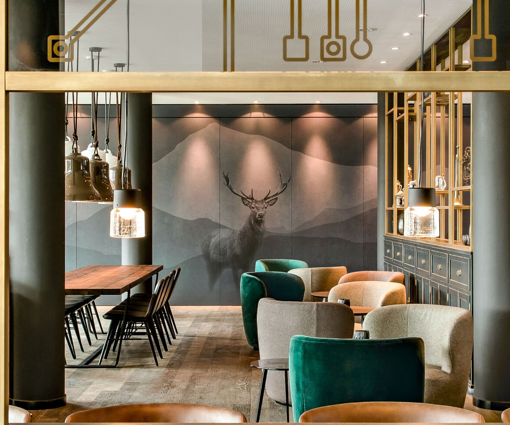 designhotel Munich Parkstadt Schwabing Motel One tables and chairs to linger at
