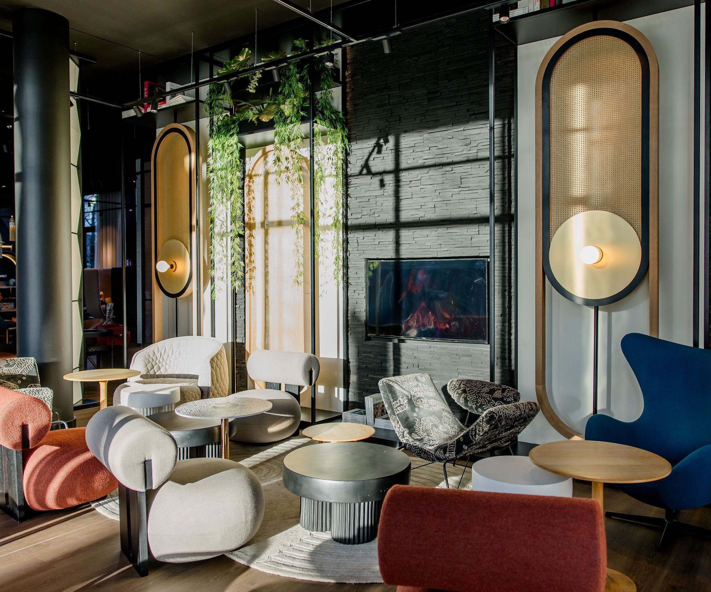 Hotel Dusseldorf Hauptbahnhof Motel One lounge with direct sunlight on several seating areas