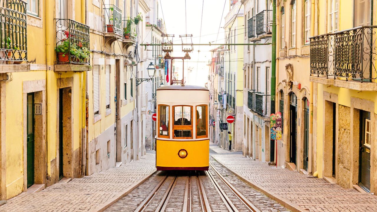 Lisbon city with yellow streetcar