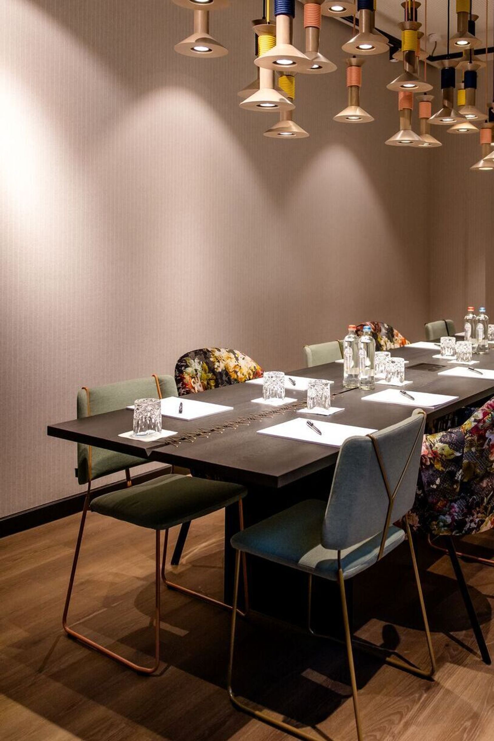 designhotel Antwerp Motel One meeting room with table and TV