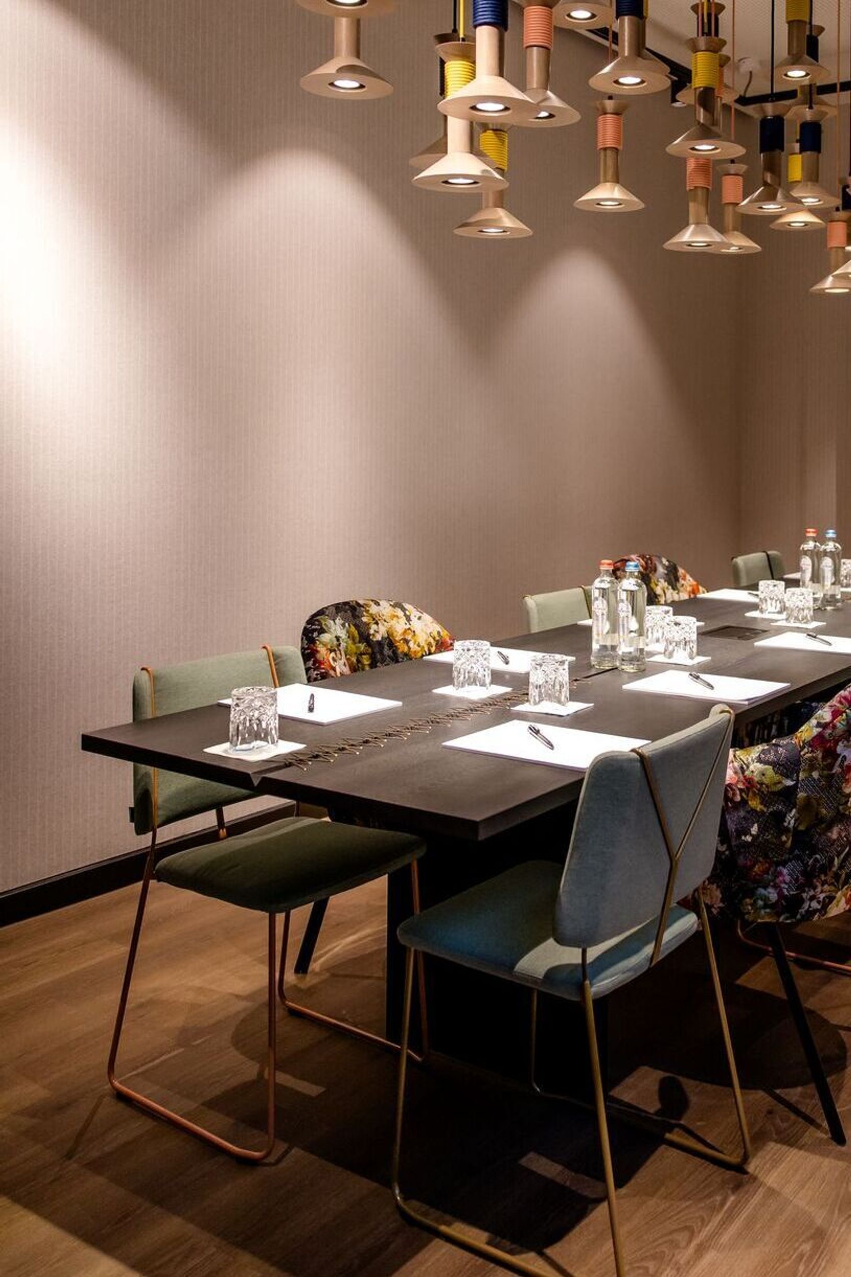 designhotel Antwerp Motel One meeting room with table and TV