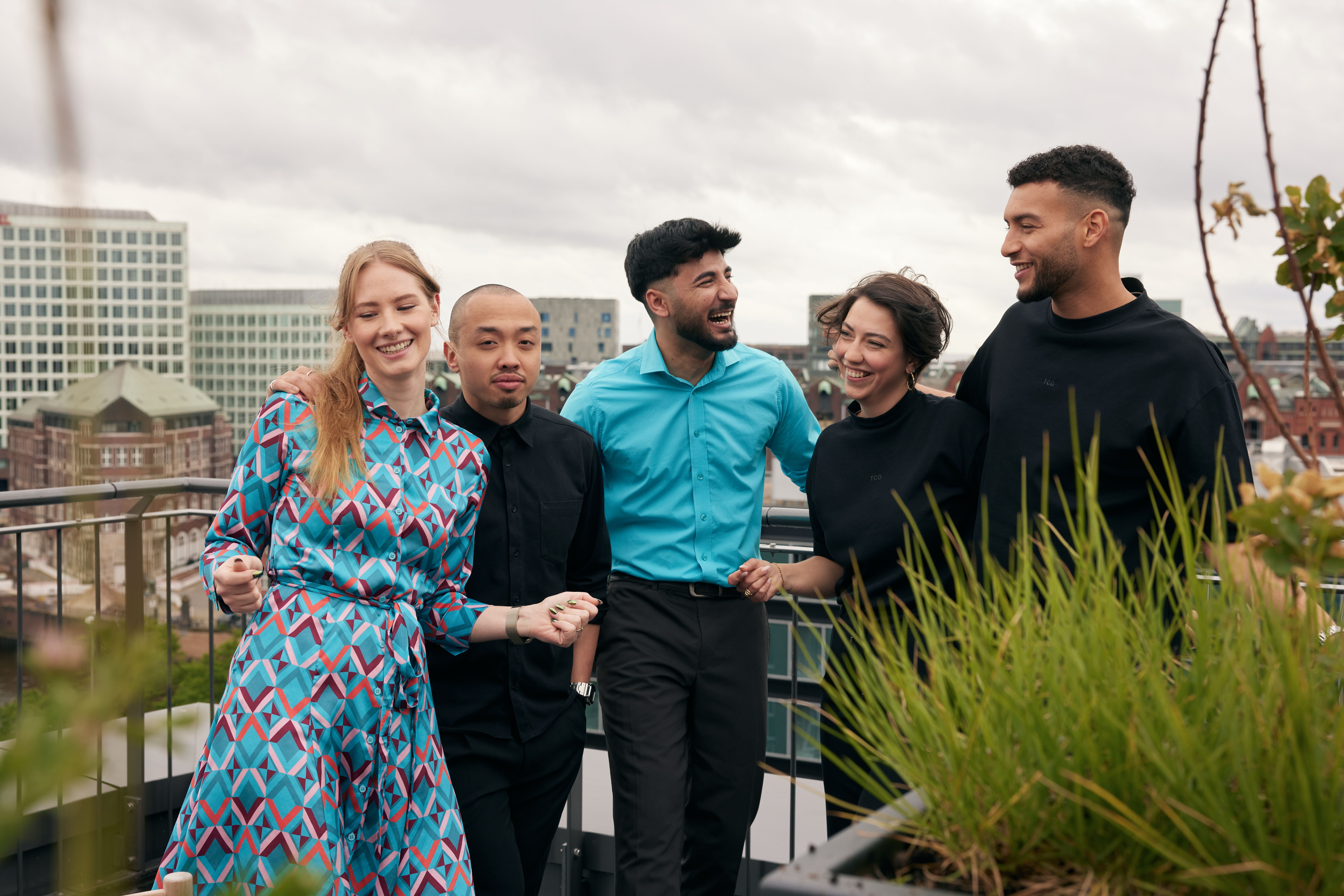 Motel One & The Cloud One employees on rooftop having fun